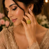 Traditional Gold Floral Ring with Emerald Green Stone