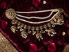 Royal Antique Gold-Finish Pearl Jhumka with Multi-Strand Sahara Hair Chain