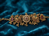 Antique Gold-Plated Floral Motif Statement Bracelet on Teal Background