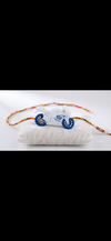 Fun White Motorcycle Toy Rakhi with Colorful Festive Thread for Kids